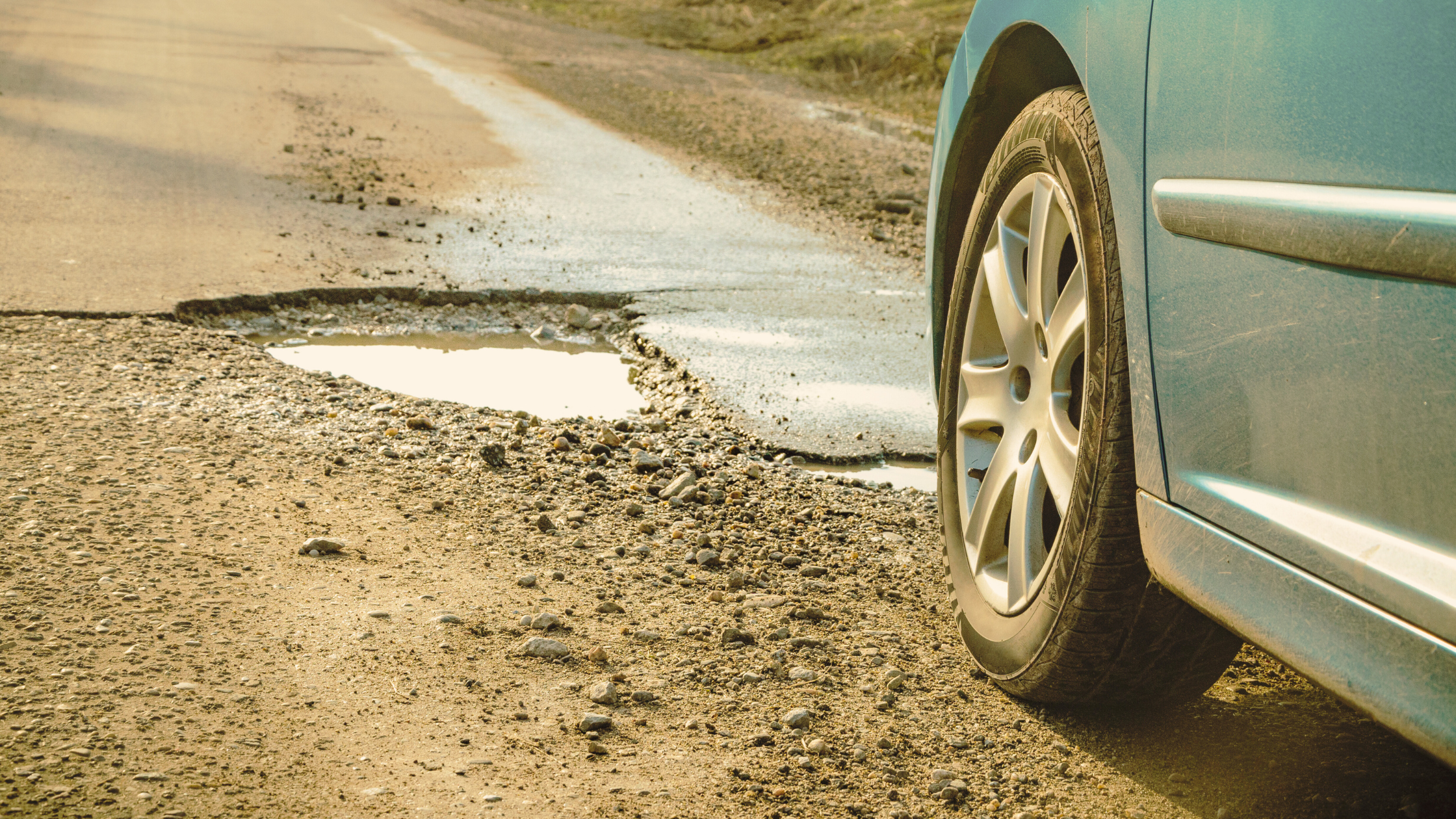 Dodging Potholes? How to Protect Your Ride (And What Not to Do)